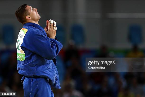 Varlam Liparteliani of Georgia reacts against Donghan Gwak of Korea during a Men's -90kg Semifinal bout on Day 5 of the Rio 2016 Olympic Games at...