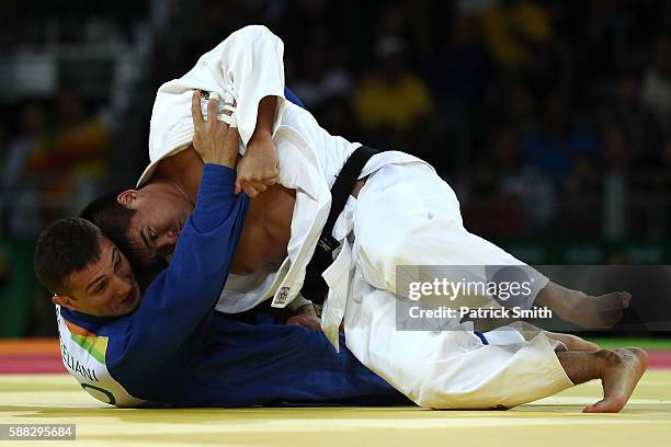 Mashu Baker of Japan competes against Varlam Liparteliani of Georgia during the Men's -90kg Gold Medal bout on Day 5 of the Rio 2016 Olympic Games at...