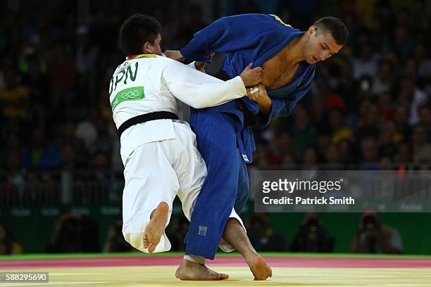 Mashu Baker of Japan competes against Varlam Liparteliani of Georgia during the Men's -90kg Gold Medal bout on Day 5 of the Rio 2016 Olympic Games at...