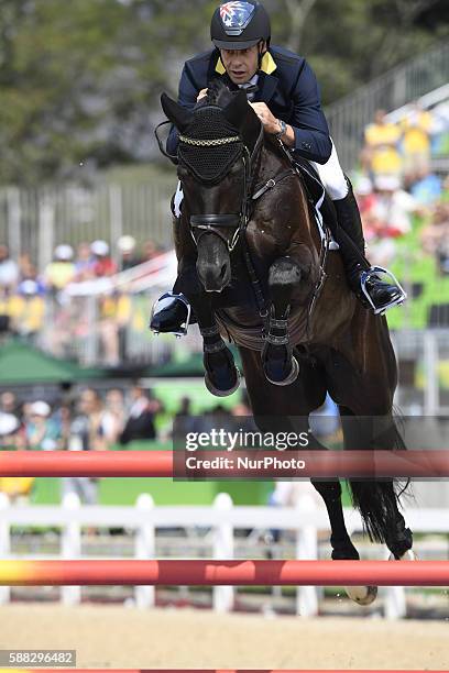 Christopher Burton of Australia competes during the equestrian eventing team jumping final at the 2016 Rio Olympic Games in Rio de Janeiro, Brazil,...