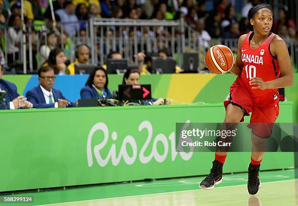Nirra Fields of Canada dribbles the ball against Senegal in the Women's Basketball Preliminary Round Group B match between Canada and Senegal on Day...