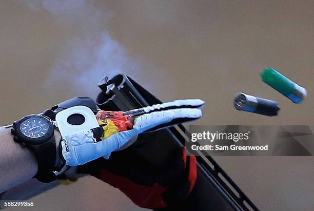 Competitor ejects shells from his shotgun on Day 5 of the Rio 2016 Olympic Games at the Olympic Shooting Centre on August 10, 2016 in Rio de Janeiro,...