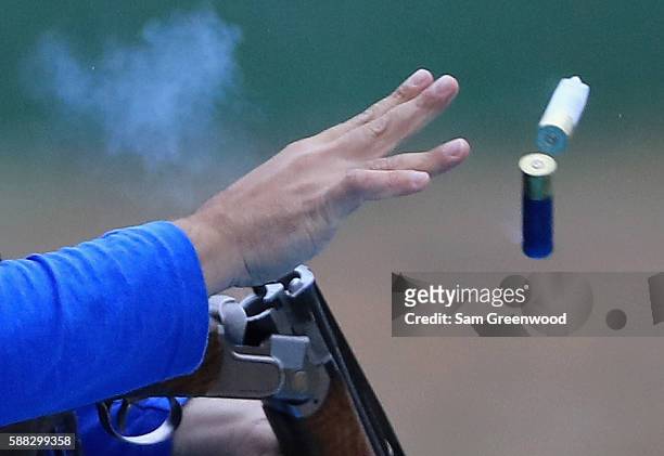 Competitor ejects shells from his shotgun on Day 5 of the Rio 2016 Olympic Games at the Olympic Shooting Centre on August 10, 2016 in Rio de Janeiro,...