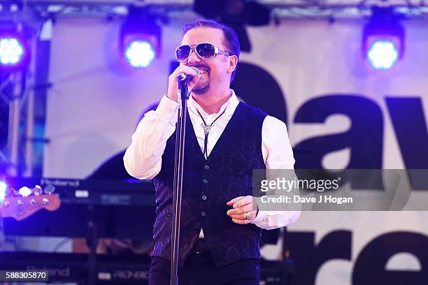 David Brent & Foregone Conclusion perform during the World premiere of "David Brent: Life on the Road" at Odeon Leicester Square on August 10, 2016...
