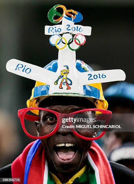 Fans of South Africa cheer their team during their Rio 2016 Olympic Games First Round Group A men's football match South Africa vs Iraq at the...