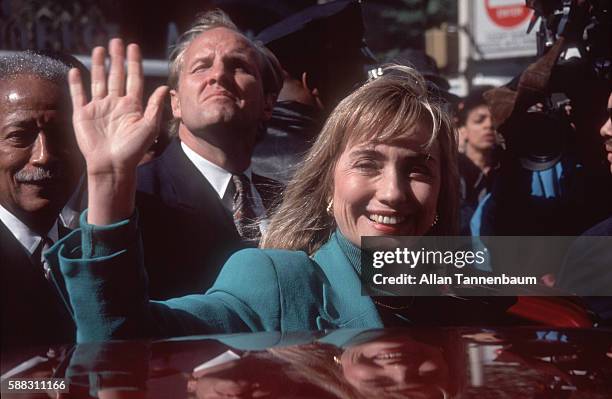 American lawyer Hillary Clinton waves as she steps into car after a Presidential campaign rally for her husband, Brooklyn, New York, New York,...