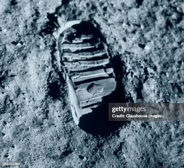 footprint on moon - footsteps stock-fotos und bilder