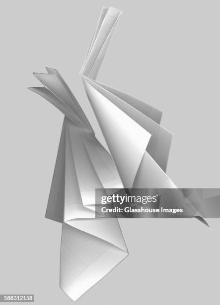 paper folded into abstract shapes - origami stock pictures, royalty-free photos & images