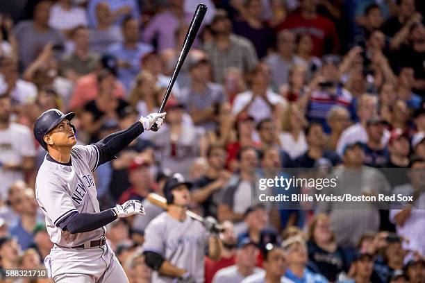 Alex Rodriguez of the New York Yankees flies out during a pinch-hit appearance during the seventh inning of a game against the Boston Red Sox on...