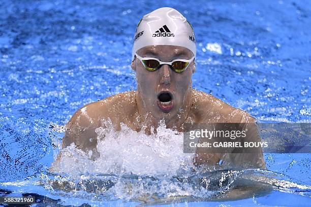 Brazil's Henrique Rodrigues competes in the Men's 200m Individual Medley Semifinal during the swimming event at the Rio 2016 Olympic Games at the...