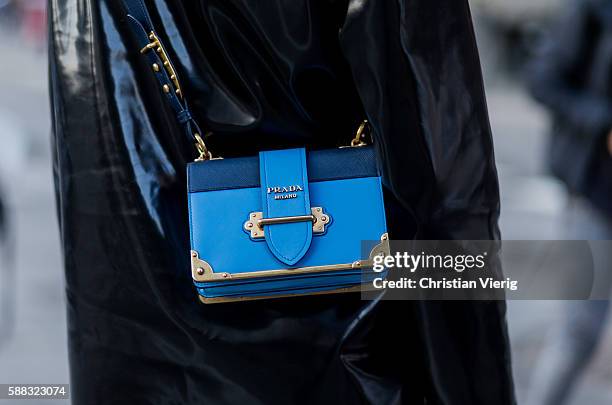 Veronika Heilbrunner wearing a black rain coat and Prada bag outside Lala Berlin during the first day of the Copenhagen Fashion Week Spring/Summer...