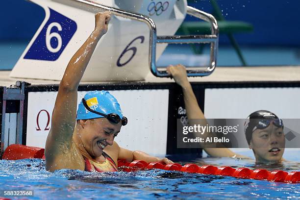 Mireia Belmonte Garcia of Spain celebrates winning gold in the Women's 200m Butterfly Final on Day 5 of the Rio 2016 Olympic Games at the Olympic...