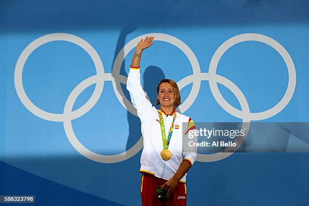 Gold medalist Mireia Belmonte Garcia of Spain poses on the podium during the medal ceremony for the Women's 200m Butterfly Final on Day 5 of the Rio...