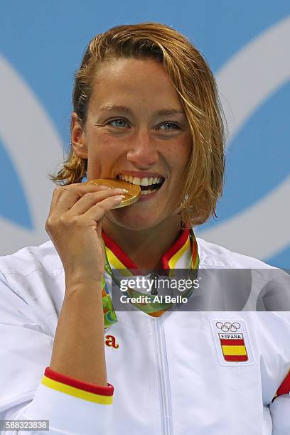 Gold medalist Mireia Belmonte Garcia of Spain poses on the podium during the medal ceremony for the Women's 200m Butterfly Final on Day 5 of the Rio...