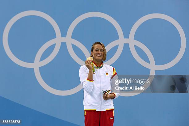 Gold medalist Mireia Belmonte Garcia of Spain poses on the podium during the medal ceremony for the Women's 200m Butterfly Final on Day 5 of the Rio...