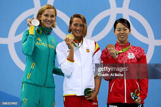 Silver medalist Madeline Groves of Australia, Gold medalist Mireia Belmonte Garcia of Spain and bronze medalist Natsumi Hoshi of Japan pose on the...
