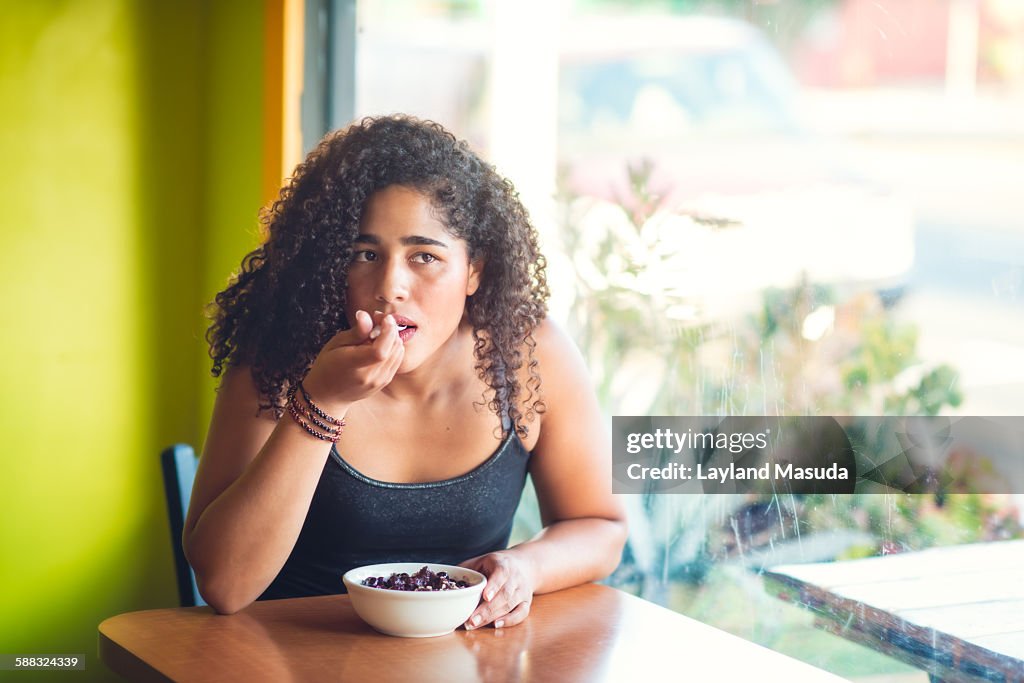 Eating a healthy acai bowl