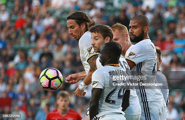Emmanuel Boateng, Mike Magee, Alan Gordon, Leonardo and Jeff Larentowicz of the Los Angeles Galaxy defend an FC Dallas direct free kick during the...