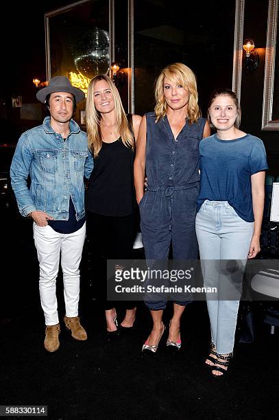 Johnathan Crocker, Erica Krusen, Francoise Koster and Jessica Kantor attend Glamour and AG Denim & Music Dinner in support of MusiCares hosted by...