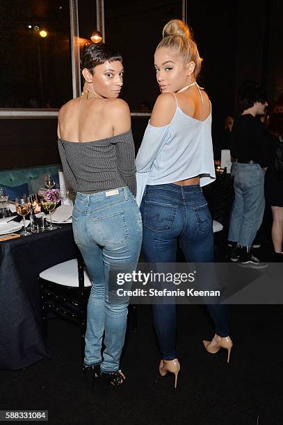 Jasmine Sanders and Brittni Jessie attend Glamour and AG Denim & Music Dinner in support of MusiCares hosted by Jessica Kantor, Johnathan Crocker,...