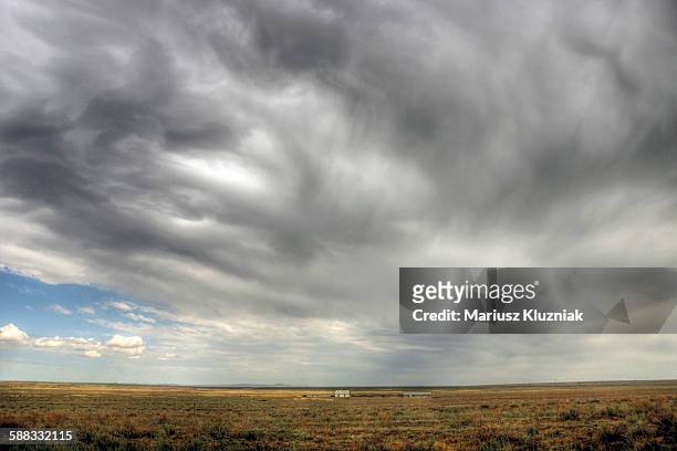 central asia steppe and remote farmhouse - semi arid stock pictures, royalty-free photos & images