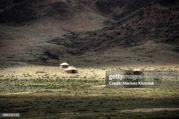 nomad yurts in central kazakhstan steppe - kazakhstan steppe stock pictures, royalty-free photos & images