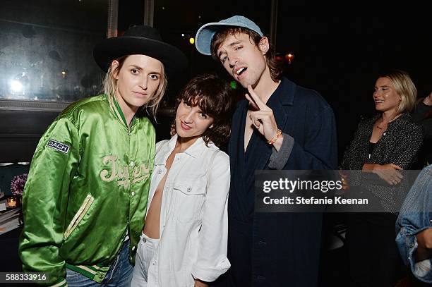 Emily Armstrong, Liz Nistico and Louie Diller attend Glamour and AG Denim & Music Dinner in support of MusiCares hosted by Jessica Kantor, Johnathan...