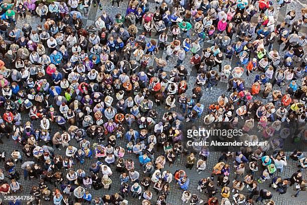 high angle view of the people crowd gathered on the street - crowd of people from above stock pictures, royalty-free photos & images