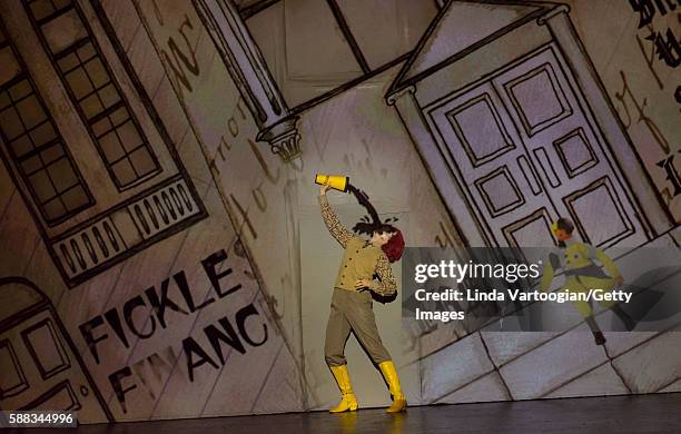 Against an animated projection, British actress Shamira Turner performs in 'Golem' during the final dress rehearsal at the Lincoln Center Festival,...