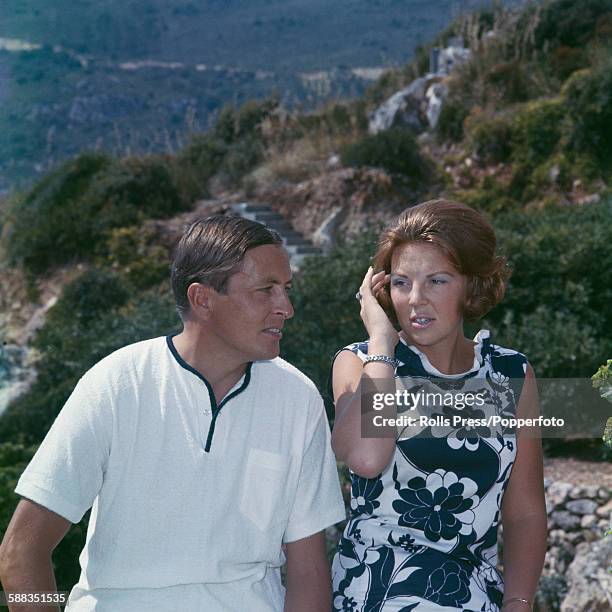 Princess Beatrix of the Netherlands pictured with her husband Claus von Amsberg on the terrace at the Duth Royal Family's holiday villa in Porto...