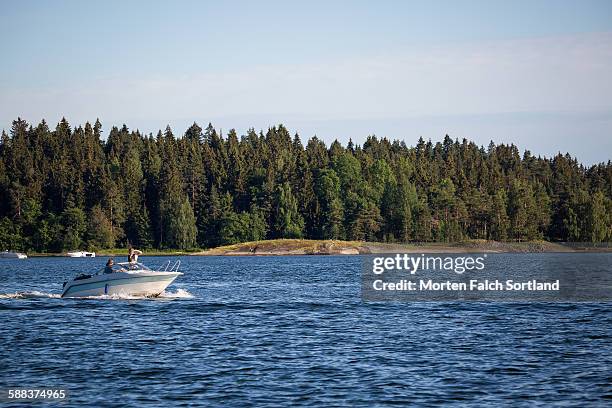 motor boat on the lake - motorboat stock pictures, royalty-free photos & images