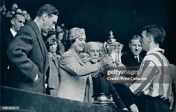 The Queen Presents The Cup', 1937. From The Sphere - Coronation Record Number. .