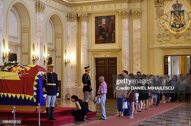 Romanians pay respect to the late Queen Anne of Romania at the Royal Palace, now The Art Museum of Romania, in Bucharest on August 11, 2016. The body...