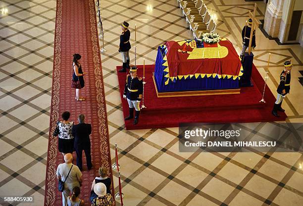 Romanian pay respect to the late Queen Anne of Romania at the Royal Palace, now The Art Museum of Romania, in Bucharest August 11, 2016. The body of...