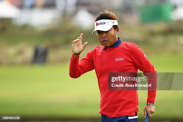 Shingo Katayama of Japan reacts to his birdie on the third green during the first round of men's golf on Day 6 of the Rio 2016 Olympics at the...