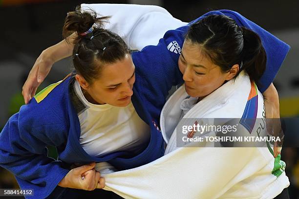 Mongolia's Lkhamdegd Purevjargal competes with Hungary's Abigel Joo during their women's -78kg judo contest match of the Rio 2016 Olympic Games in...