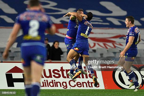 Josh Reynolds of the Bulldogs celebrates scoring a try to win the match during the round 23 NRL match between the Canterbury Bulldogs and the Manly...