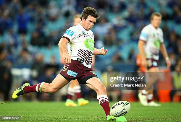 Jamie Lyon of the Eagles attempts a field goal during the round 23 NRL match between the Canterbury Bulldogs and the Manly Sea Eagles at ANZ Stadium...