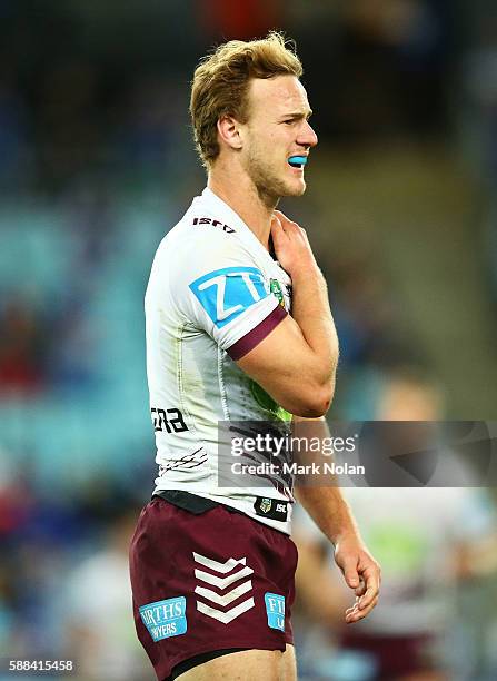 Daly Cherry-Evans of the Eagles suffers from a shoulder injury during the round 23 NRL match between the Canterbury Bulldogs and the Manly Sea Eagles...