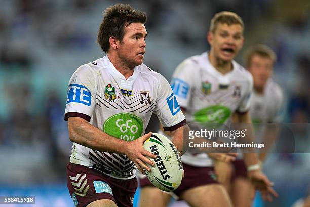 Jamie Lyon of Manly runs the ball during the round 23 NRL match between the Canterbury Bulldogs and the Manly Sea Eagles at ANZ Stadium on August 11,...