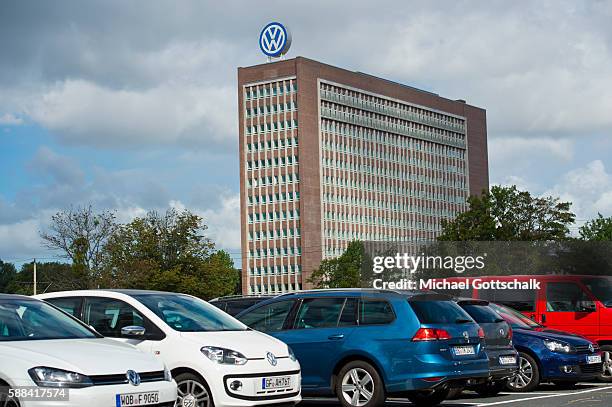 Wolfsburg, Germany Office Builiding of Volkswagen AG headquarters seen behind VW employees car park on August 09, 2016 in Wolfsburg, Germany.