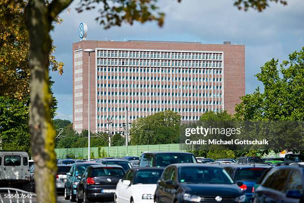 Wolfsburg, Germany Office Builiding of Volkswagen AG headquarters seen behind VW employees car park on August 09, 2016 in Wolfsburg, Germany.