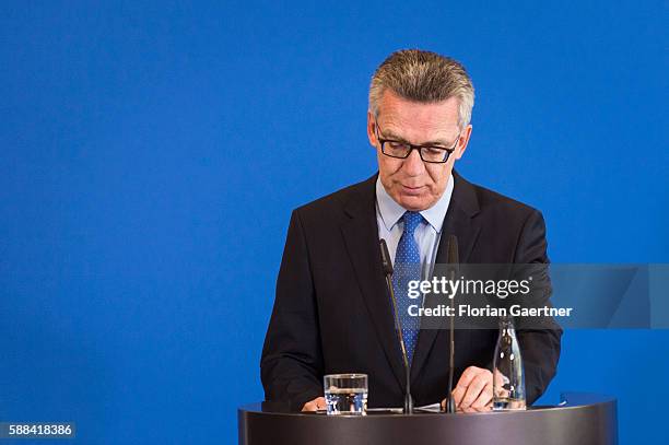 German Interior Minister Thomas de Maiziere gives a press statement about new measures against the terror threat in Germany on August 11, 2016 in...