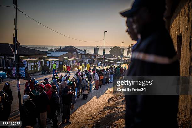 Alexandra township residents queue to cast their votes during the 2016 Local Government Elections on August 03, 2016 in Johannesburg, South Africa....
