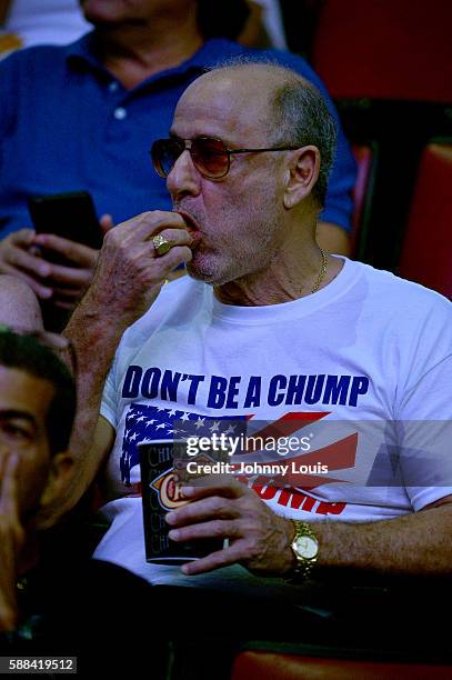 People cheer as Republican presidential nominee Donald Trump speaks during his campaign event at the BB&T Center on August 10, 2016 in Sunrise,...