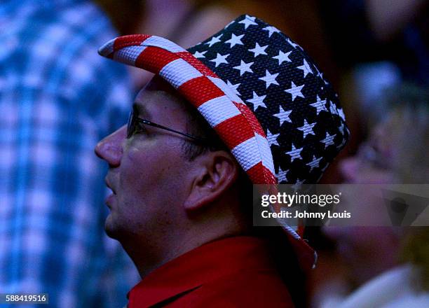 People cheer as Republican presidential nominee Donald Trump speaks during his campaign event at the BB&T Center on August 10, 2016 in Sunrise,...