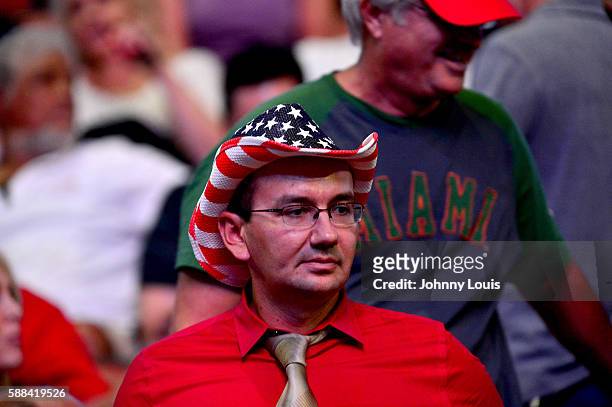 People cheer as Republican presidential nominee Donald Trump speaks during his campaign event at the BB&T Center on August 10, 2016 in Sunrise,...