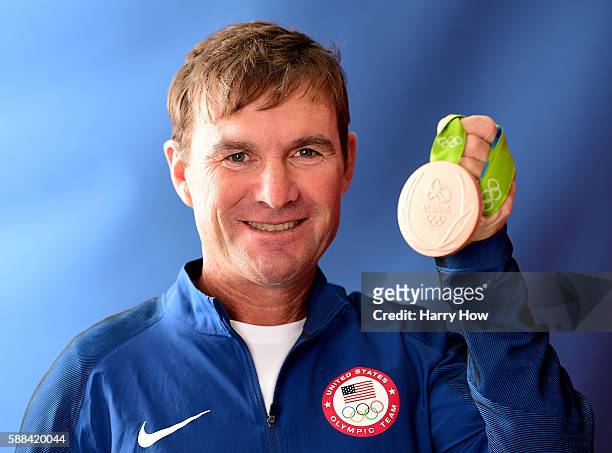 Equestrian, Phillip Dutton of the United states poses for a photo with his bronze medal on the Today show set on Copacabana Beach on August 10, 2016...