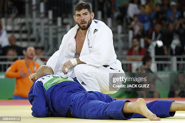 France's Cyrille Maret competes with Netherlands' Henk Grol during their men's -100kg judo contest match of the Rio 2016 Olympic Games in Rio de...