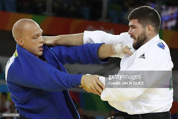 France's Cyrille Maret competes with Netherlands' Henk Grol during their men's -100kg judo contest match of the Rio 2016 Olympic Games in Rio de...